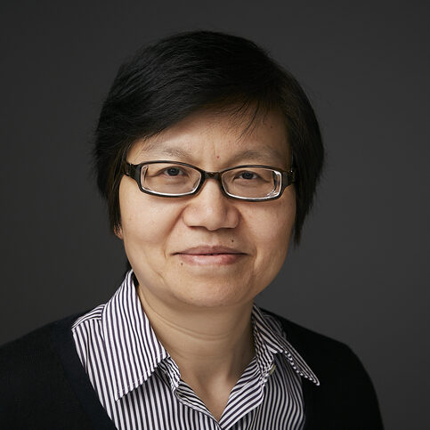 asian woman with dark short hair and glasses