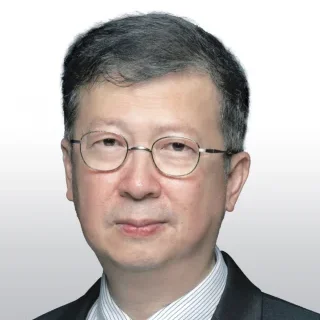 asian man with gray hair and glasses