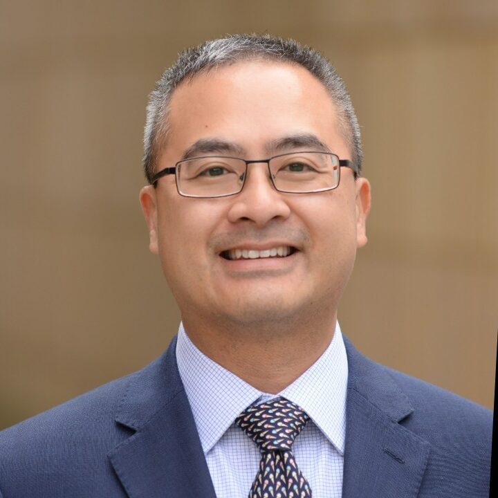 asian man with glasses