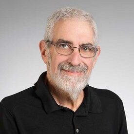 man with gray hair and beard