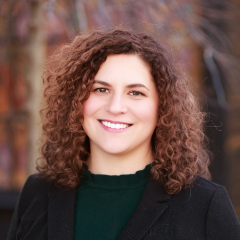 woman with dark curly hair