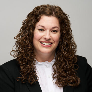 woman with dark curly hair