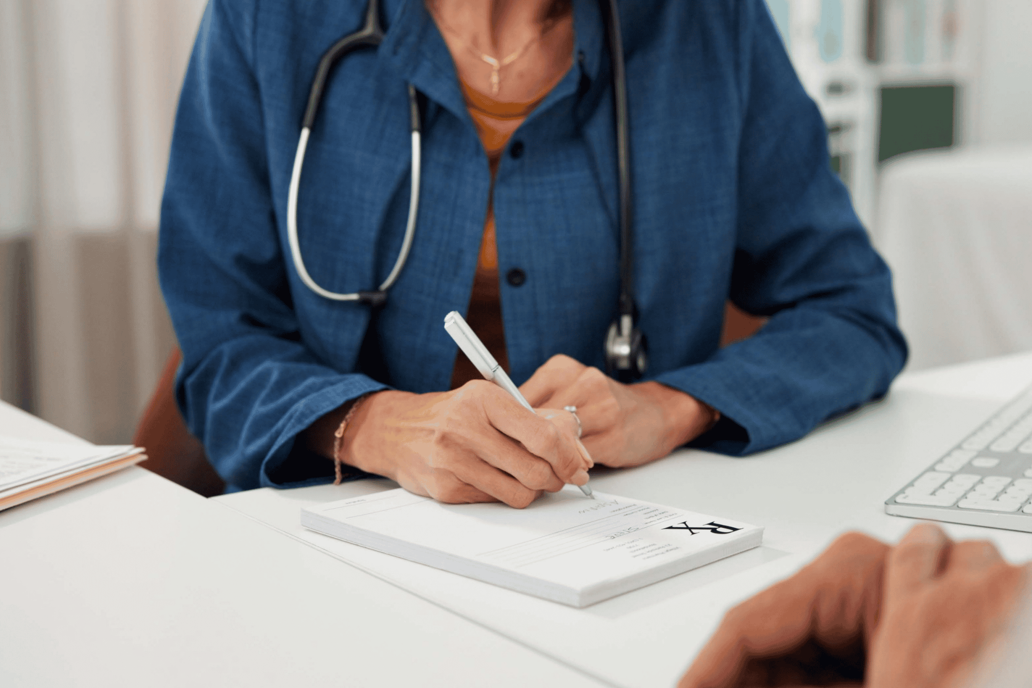 doctor writing a prescription